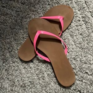 Hot pink flip flops